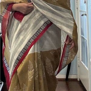 Elegant Striped Saree with Red and Gold Accents